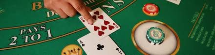 Antarmuka aplikasi nila888 baccarat pada smartphone dengan opsi streaming dan taruhan